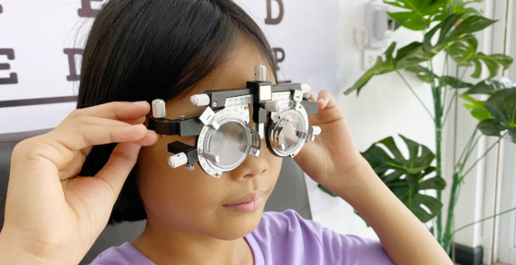 Photograph of girl having an eye test