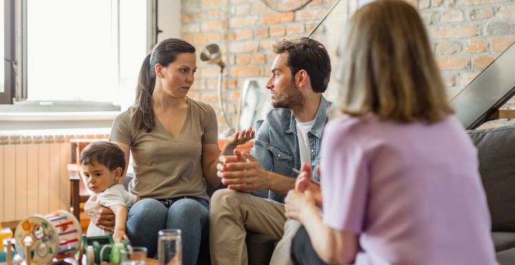 Photograph of a family during a home visit