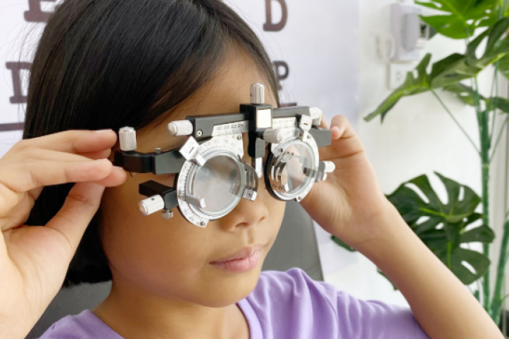 Photograph of girl having an eye test