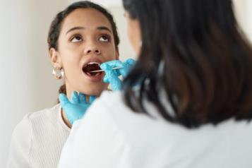 A dentist treating a patient