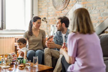 Photograph of a family during a home visit